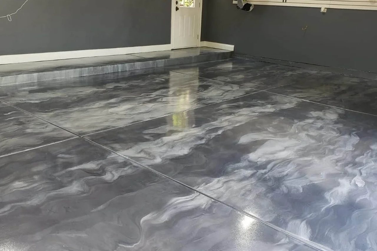 Completed residential garage floor installed by DP Flooring Services